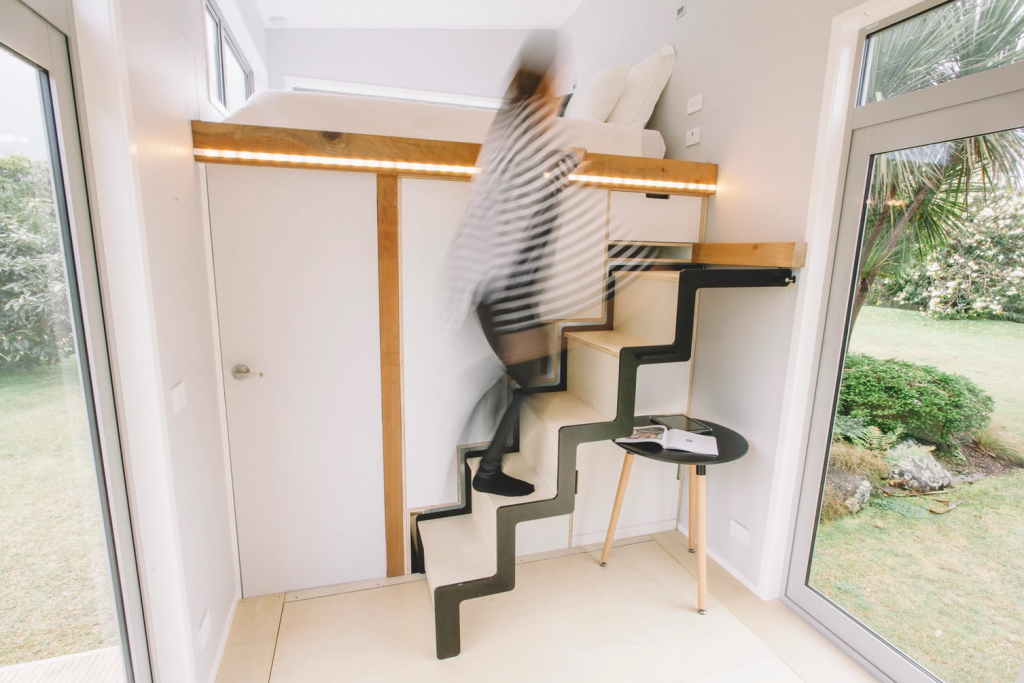 The unique staircase design in The Millennial. Photo Credit: Build Tiny