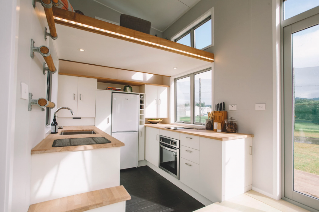 The millennial tiny house kitchen area. Photo Credit: Build Tiny