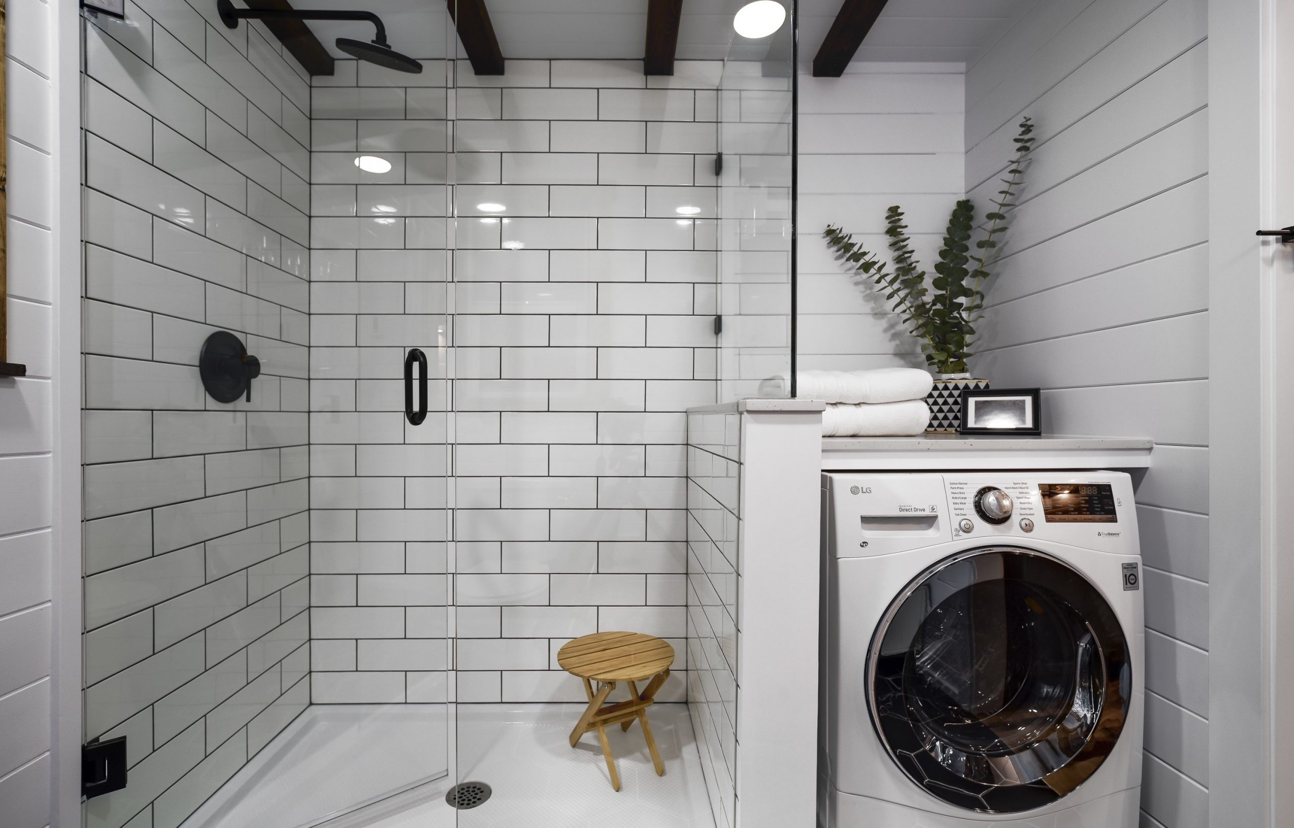 the shower in the loft tiny house is quite large for a tiny house