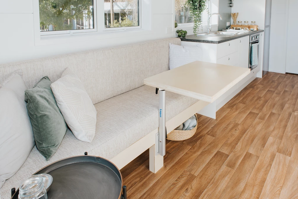 The Bister Tiny House dining table that can be attached and detatched any time.