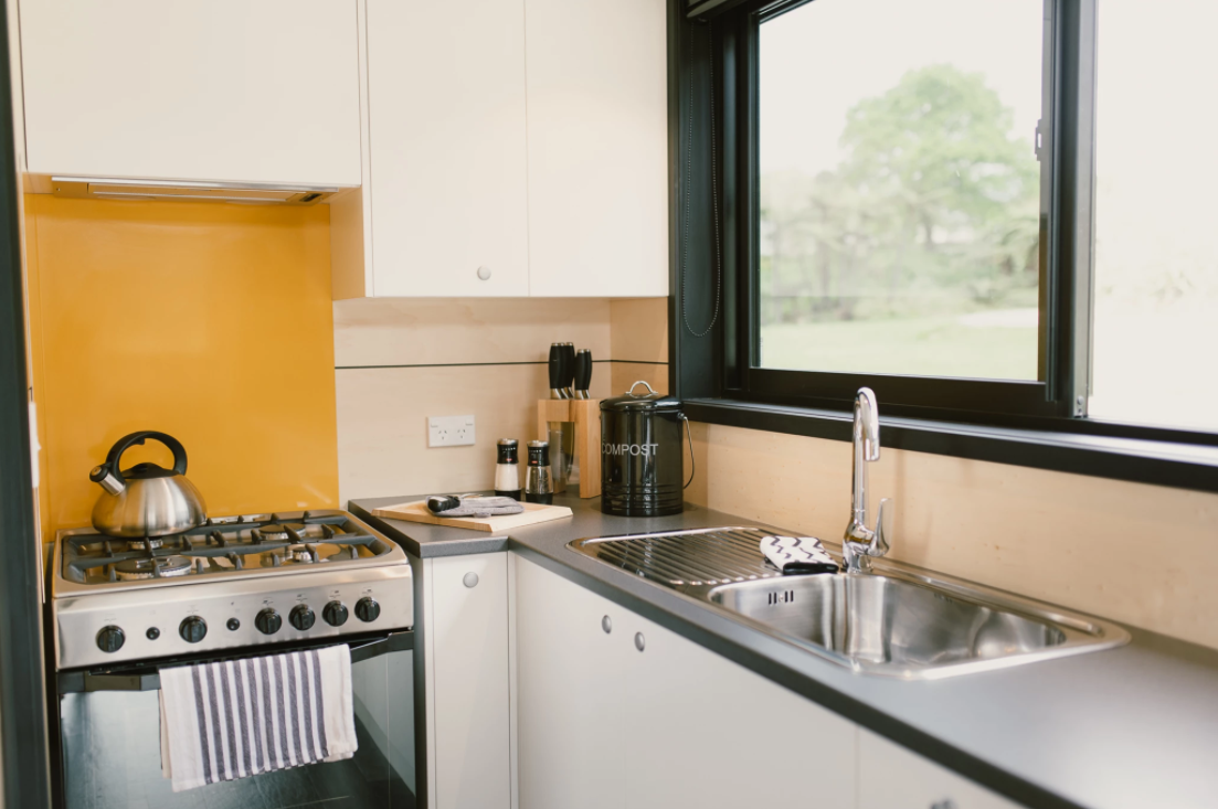 the tiny house kitchen sink in the boomer tiny house
