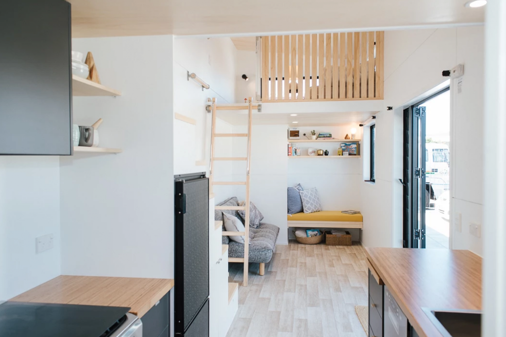 The living area on the right-hand side of the iBot tiny house.
