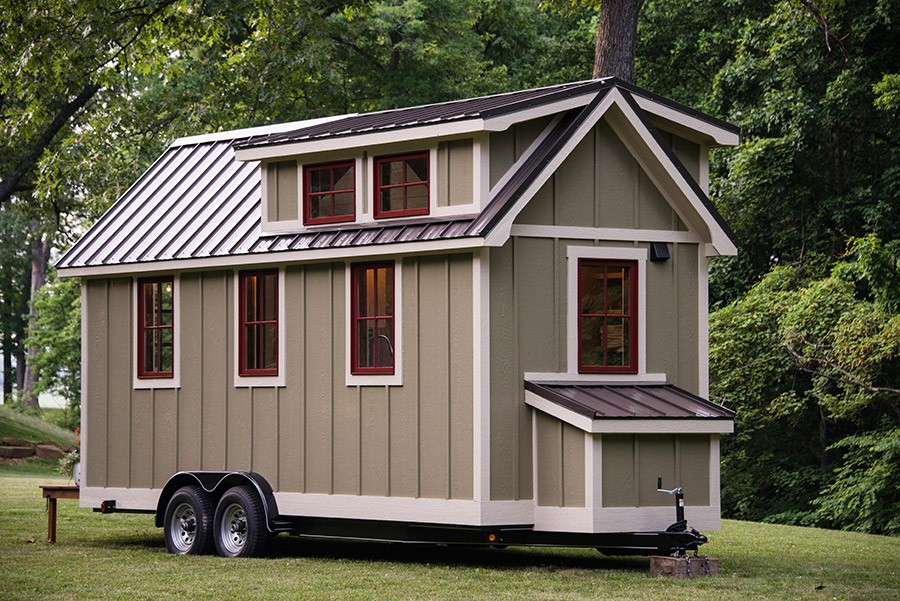 The Ynez tiny house features two sets of tiny house loft window.
