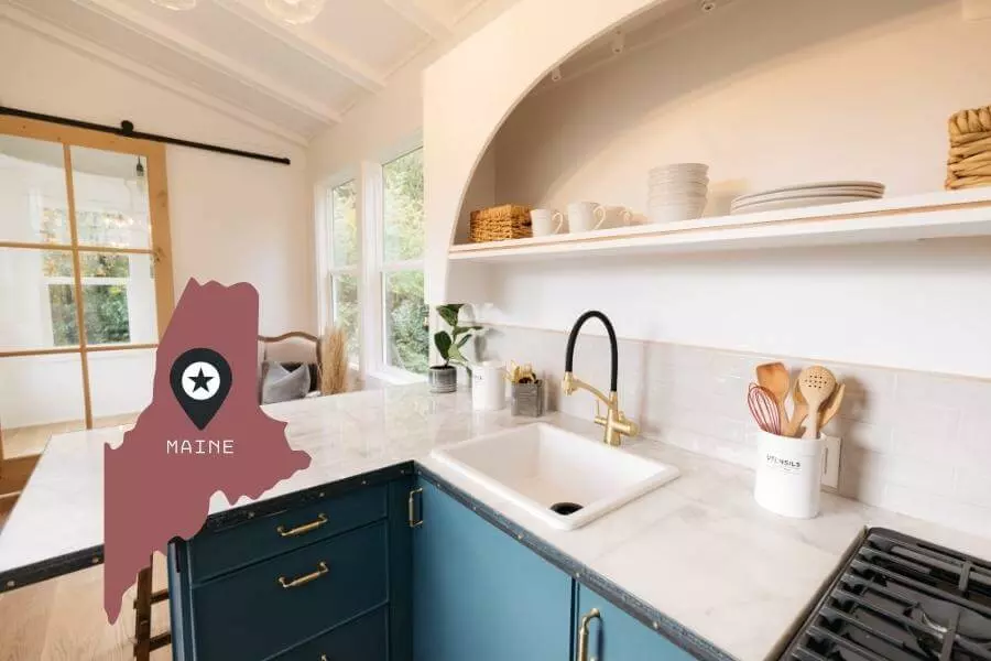 Main tiny homes with image of state of maine inside tiny house kitchen